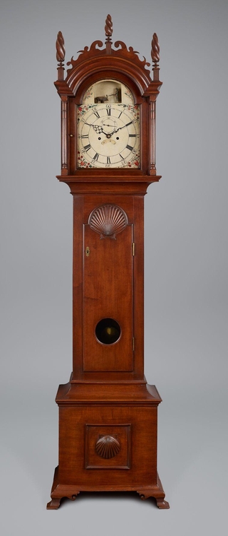 Brown tall case clock.